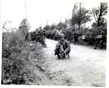 SC 320892 - Riflemen attached to a Heavy Weapons Unit take…