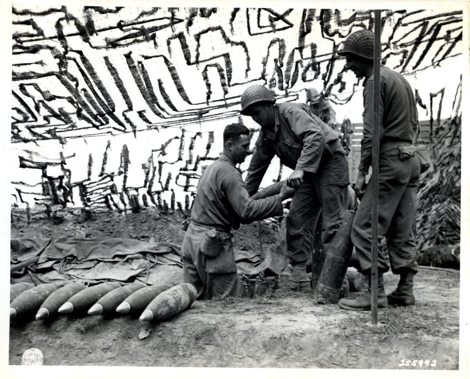 SC 255992 - Yank Artillery men pile up 155-mm ammunition, …