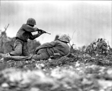 Infantrymen of the First Marine Division firing at Jap ins… photo