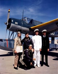 Aviation Cadets pose near OS2U used for flight training.
