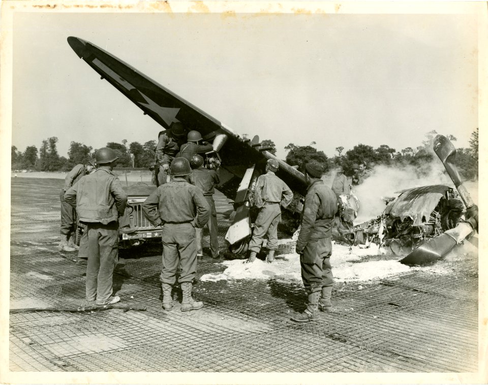 Bomb disposal squad fight fire in a plane which crashed in…