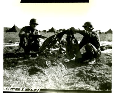 L to R: Medic Privates Joseph B. Tito, Chicago, Ill., and …