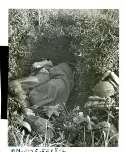 Two tired US infantrymen undisturbed by the noises of war …