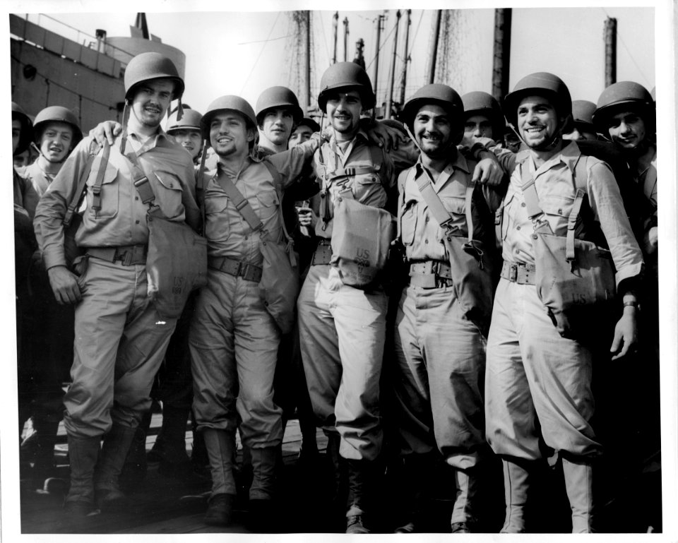 Five soldiers with beards, casuals MC on Pier 6 about to s…