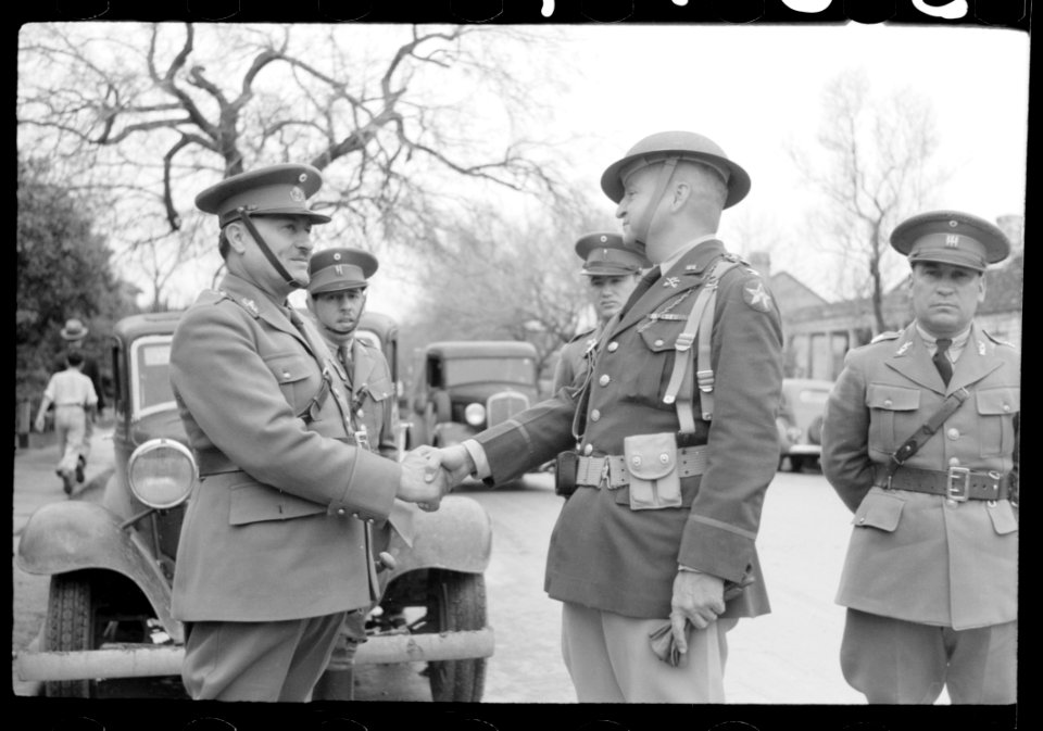 Mexican general and American colonel shake hands after rev…