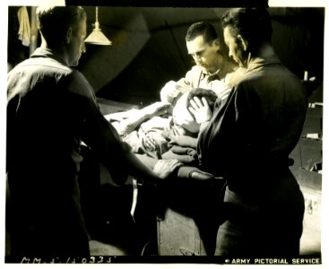 An American soldier is prepared for surgery on an operatin…