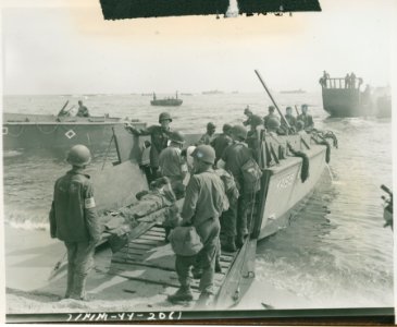 St. Tropez area, France. Wounded soldiers being evacuated … photo