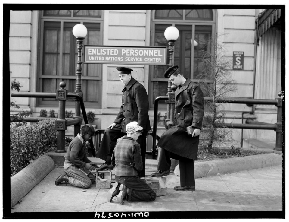 Sailors having their shoes shined outside United Nations s…