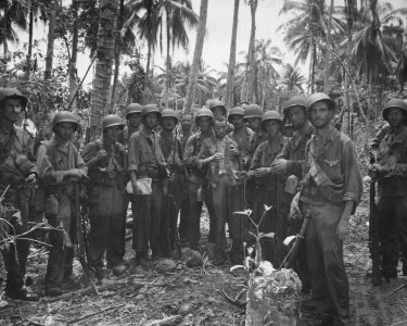A Marine patrol with a Japanese prisoner on Guadalcanal.