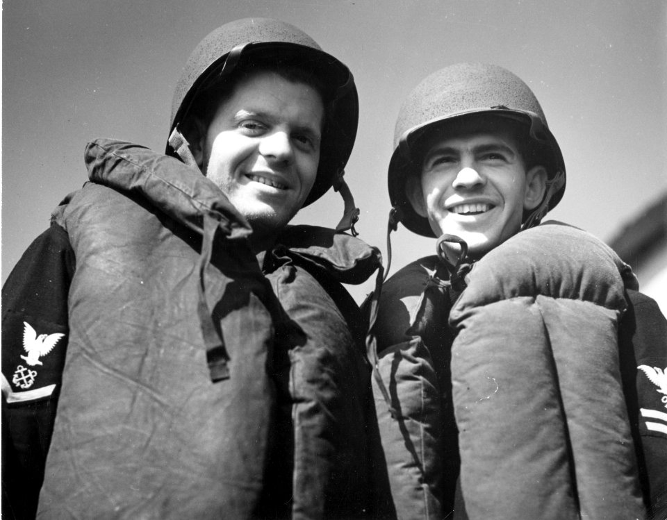Two brothers standing on the deck of a Coast Guard cutter …