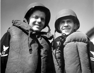 Two brothers standing on the deck of a Coast Guard cutter …