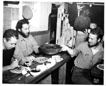 Officers and enlisted men eat the same chow aboard Coast G…