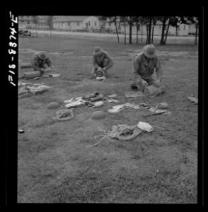 Troops at Ft. Belvoir learn how to make up their packs. Se…