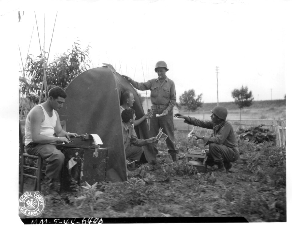 SC 190507-S - Photographers of 163rd Signal Photo Co. rush…