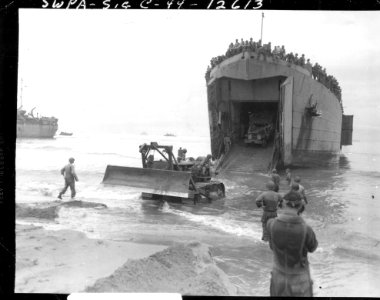 SC 190561-S - A Caterpiller pulls a 2½ ton 6 x 6 off an LS…