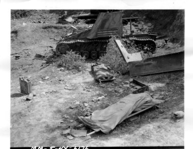 SC 190575 - Dead American soldiers lay covered with blanke… photo