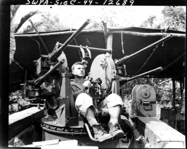 SC 190558-S - *American soldier operating M45 quadmount in…