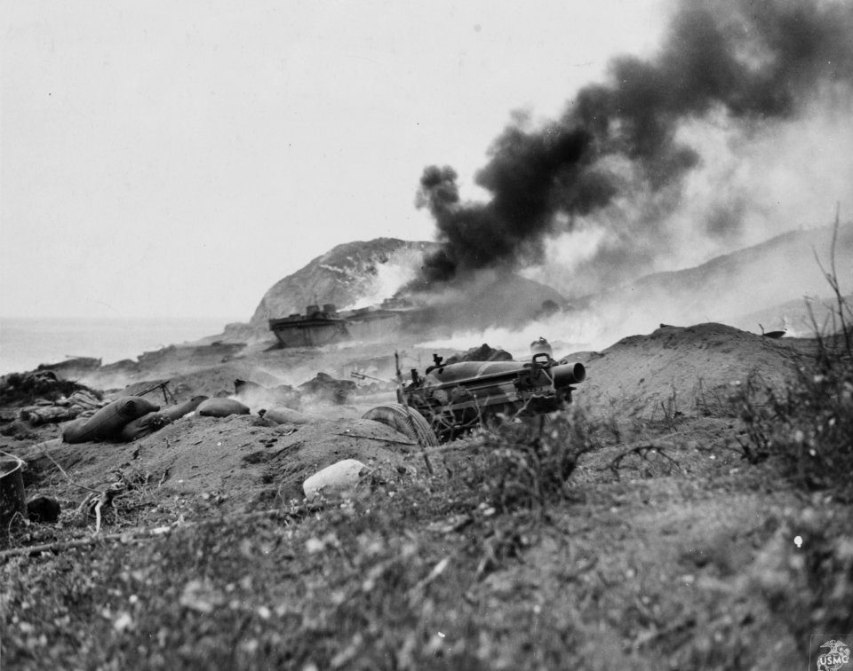 Marine Amtracs struck by Japanese mortar fire on Iwo Jima.…