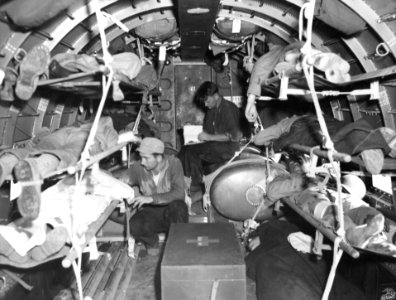 Wounded Marines leaving Iwo Jima on a C-47 en-route to Gua… photo