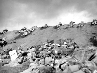 Fifth Division Marine invaders of Iwo Jima work their way …