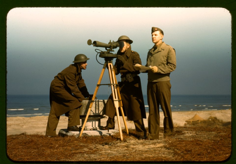 Men of Fort Story operate an azimuth instrument, to measur…