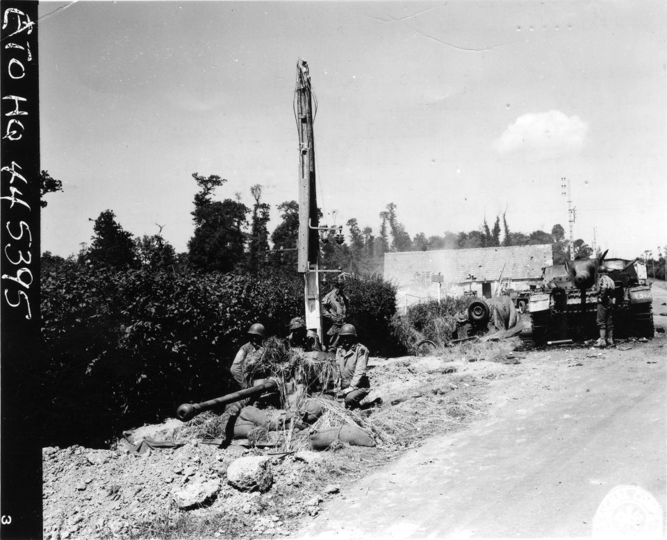 SC 190610 - Members of an American Airborne unit man a 57m…