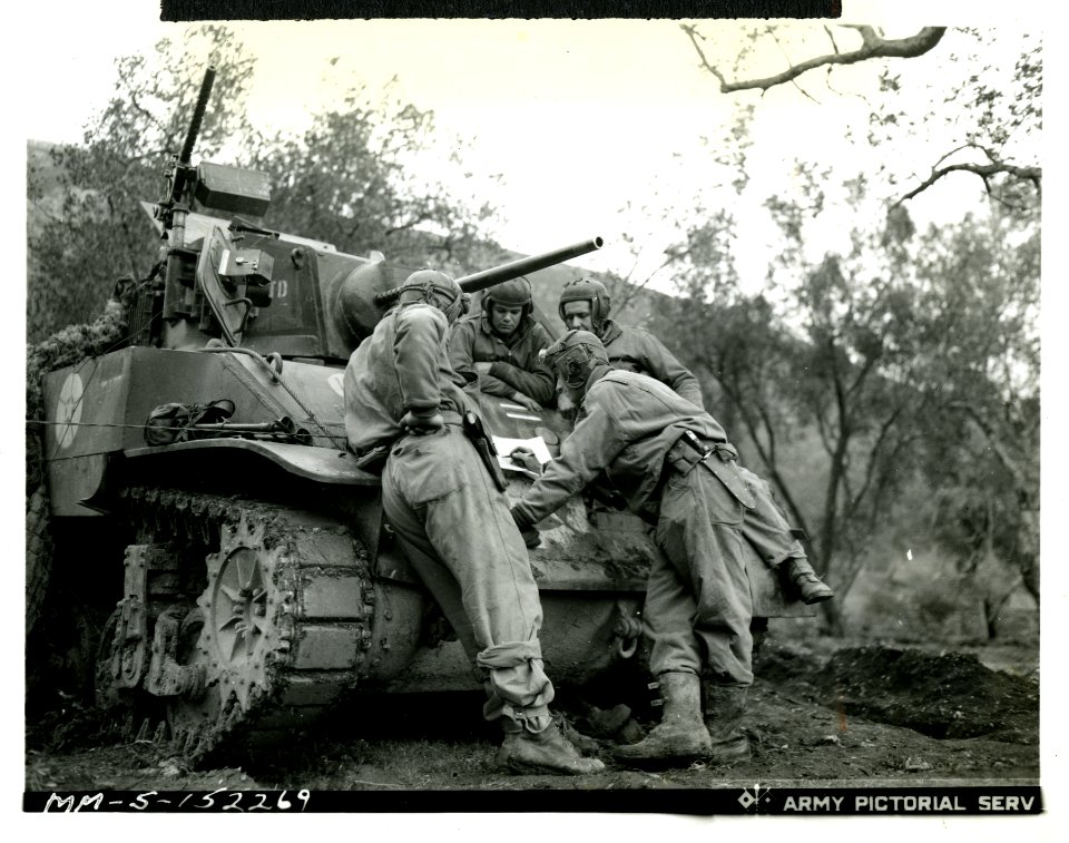 Lt. George H. Spires, Brooklyn, N.Y., going over battle ma…
