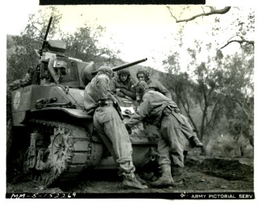 Lt. George H. Spires, Brooklyn, N.Y., going over battle ma…