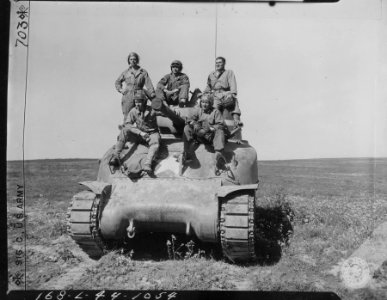 Capt. Richard Dozier with his tank crew. Front left: Pvt. …