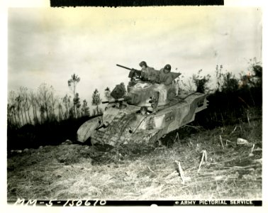 American M-4 tank "Katie Did" plowing through heavy mud an…