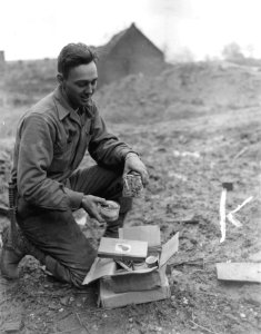 SC 196920 - PFC George E. Neidhardt, with 9th Army in Germ… photo