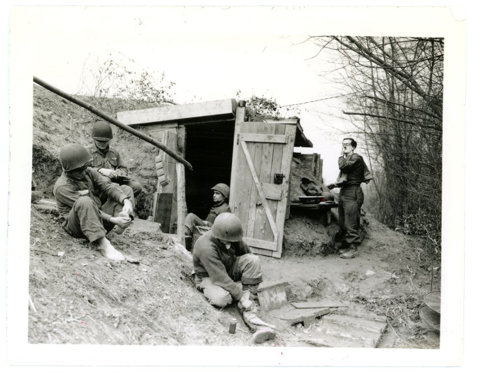 SC 200380 - Five men of an infantry squad clean up, write …