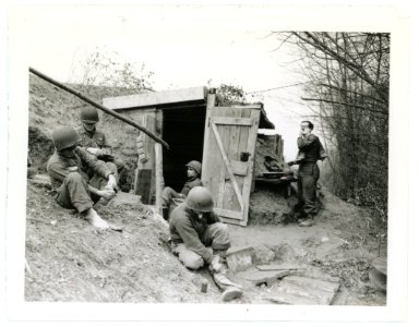 SC 200380 - Five men of an infantry squad clean up, write …