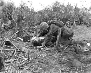 Modern Gunga Din - A Marine wounded in action at Peleliu, … photo