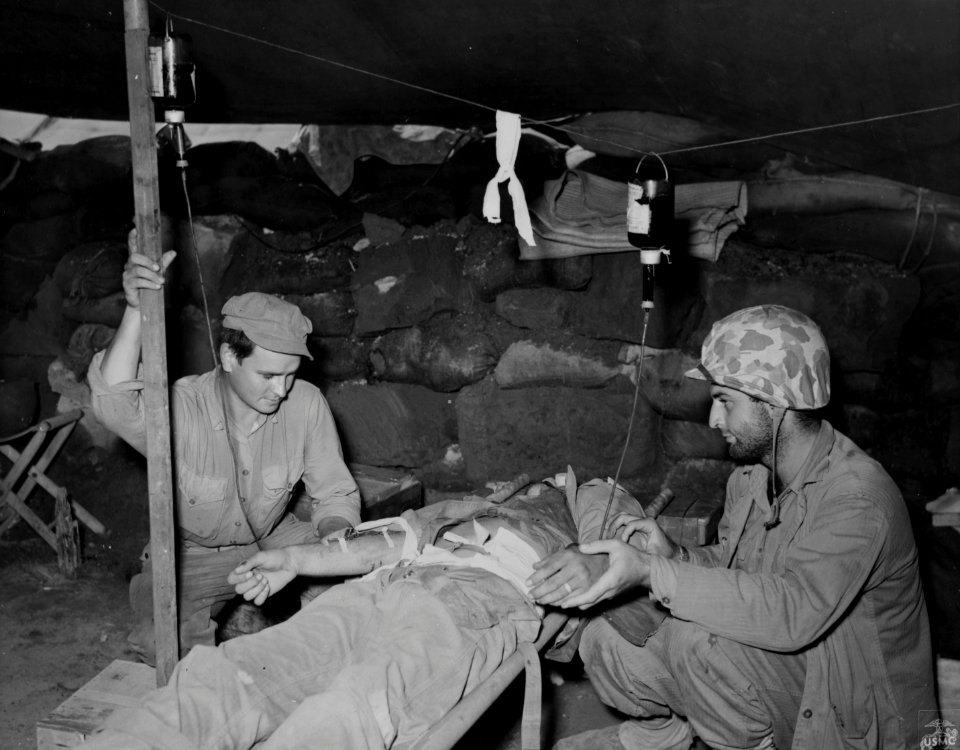 A wounded Marine receives a double transfusion of blood at…