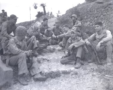Columnist Ernie Pyle and some members of the 1st Marine Di… photo