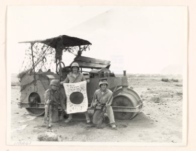 The spoils of battle on Motoyama airfield. Left to right, …