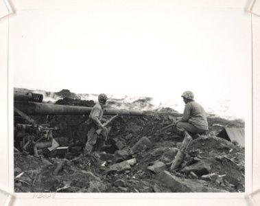 Two keen-eyed Marines, watching the smoking sulphurous are…