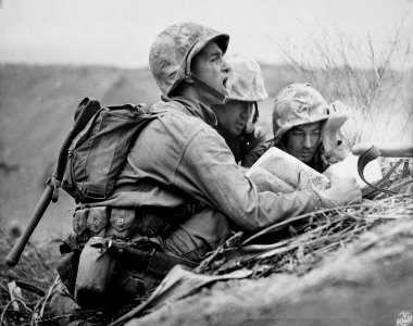 A Marine spotter yells out coordinates of a Japanese machi…