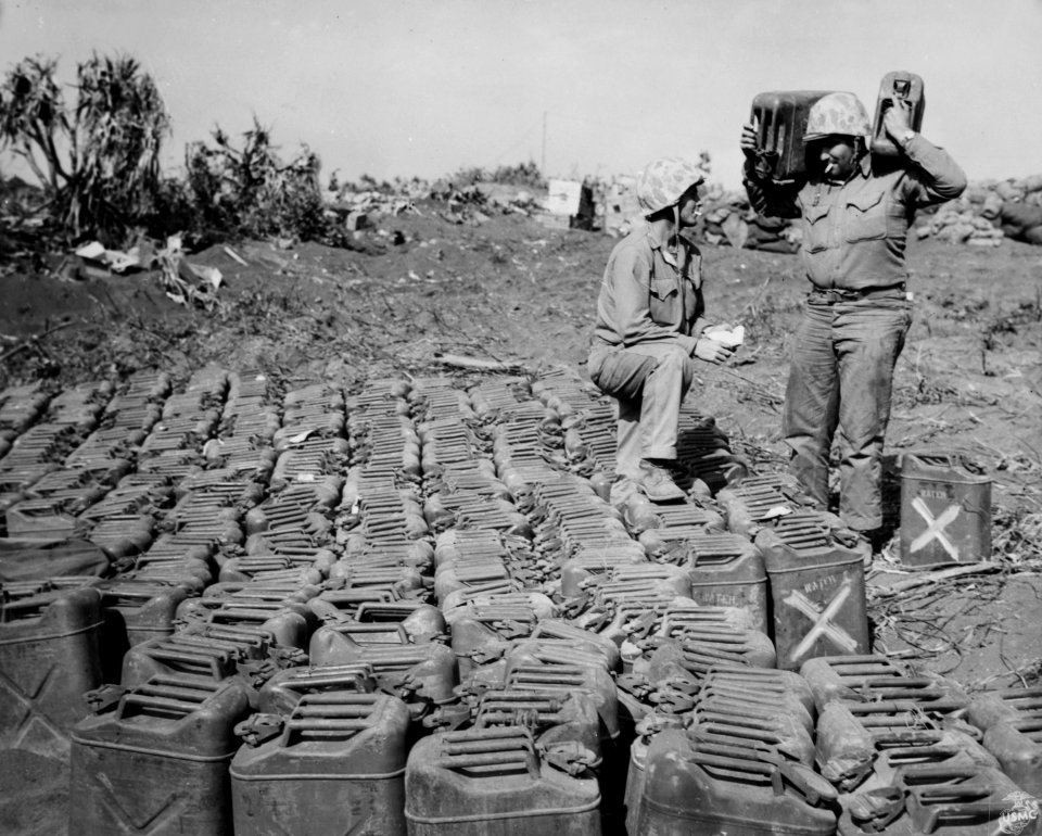 Handling the distribution of water on Iwo Jima are, (left …
