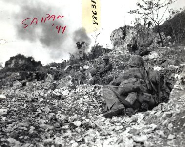 Marines held up by sniper fire near the north end of Saipa…