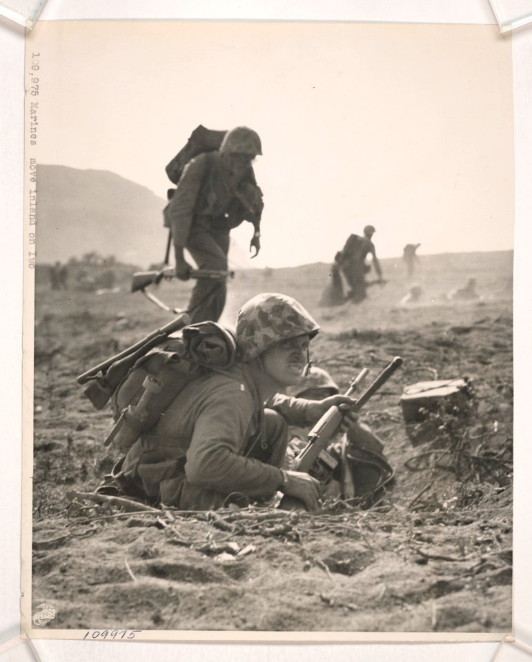 Determination written on their countenances, Marines start…