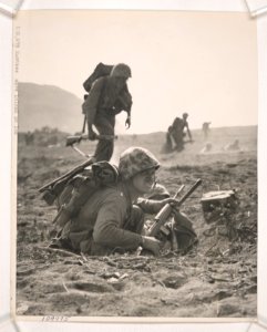 Determination written on their countenances, Marines start…