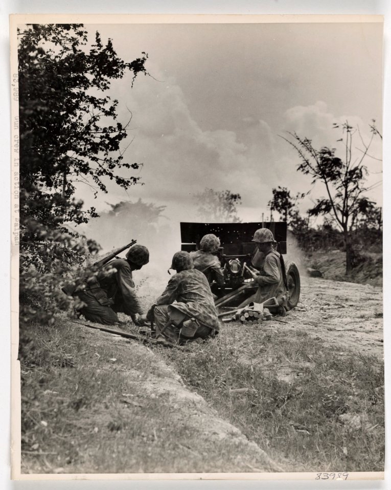These Marine gunners firing a round from a 37-mm gun at Ja…