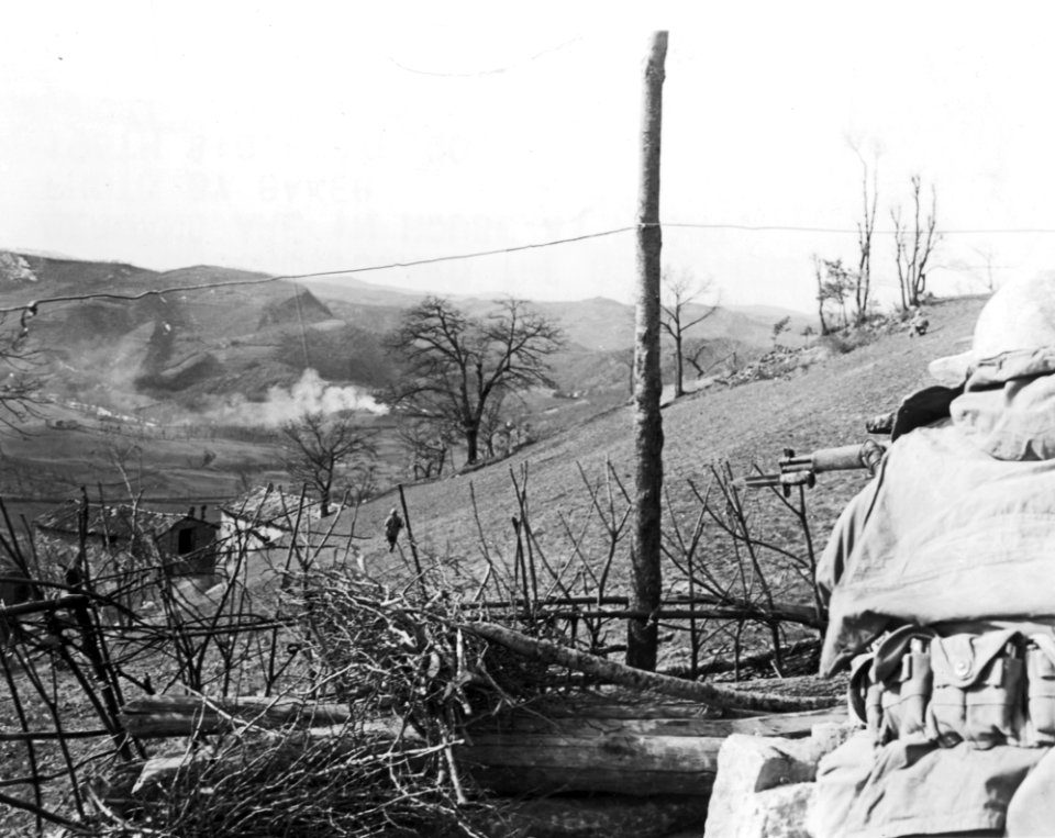 An infantryman provides cover while others advance on Germ…