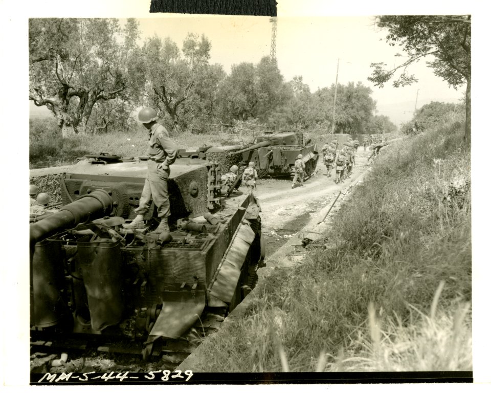 Two knocked-out German tiger tanks stand inertly at the ap…