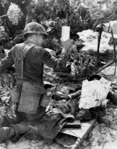 This Marine, wounded in the opening stages of the fierce s…