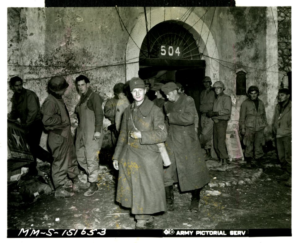 These three Germans, tired of fighting, gave themselves up…