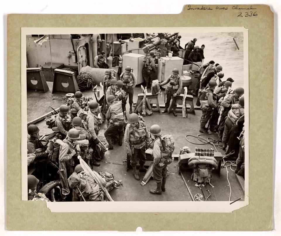 H Hour has arrived. American soldiers, hardened and ready,…