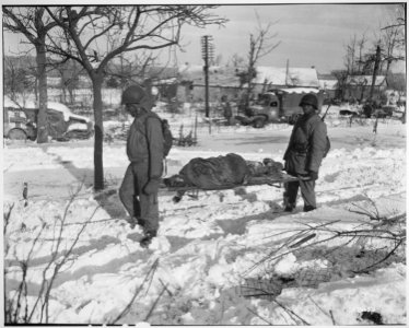 SC 226653 - Body of American soldier is borne on stretcher… photo